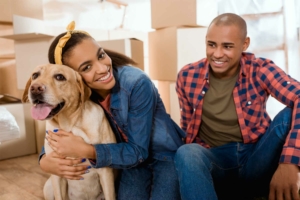 Happy couple and their dog